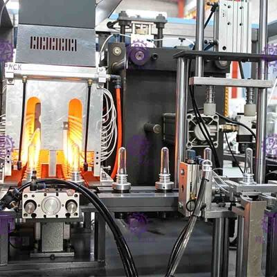 Two Cavity 0.1-2L PET Bottle Blowing Machine For Juice Processing Line